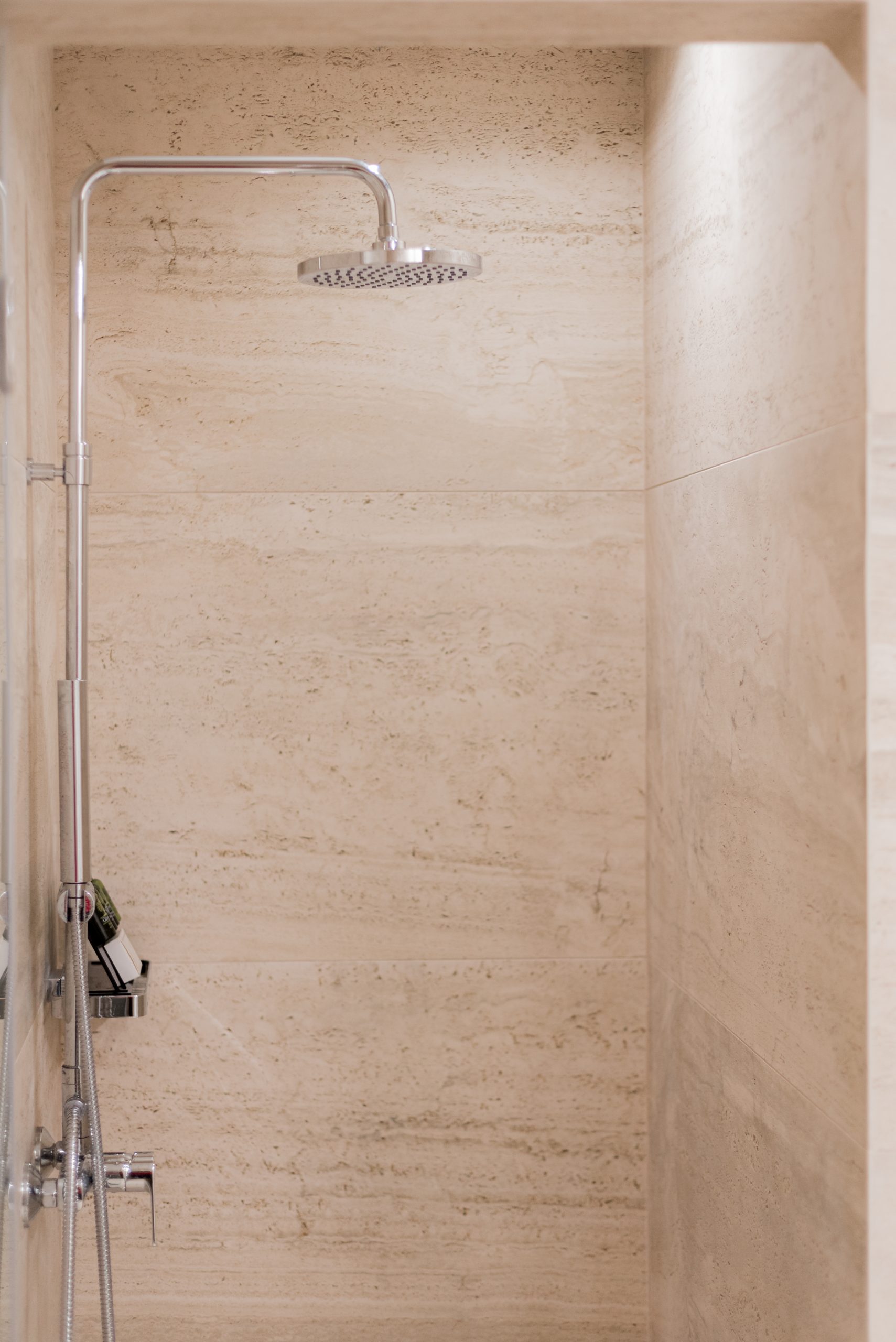 Sophisticated bathroom with walk-in shower and heated towel rack in Kolonaki Luxury Residence