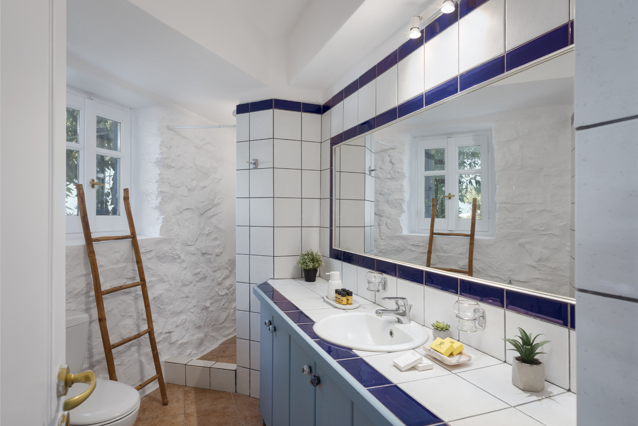 bathroom with modern design and a full shower