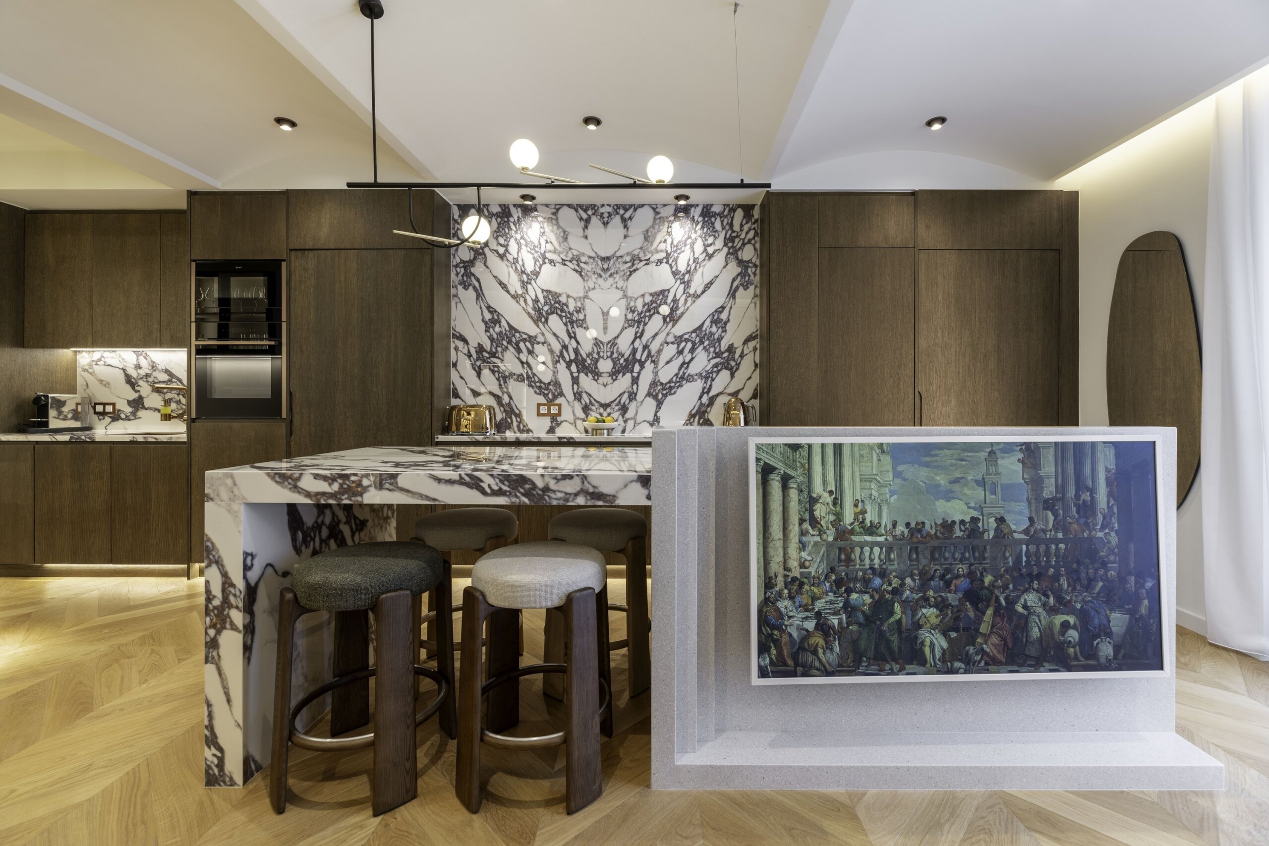 Open plan living room and fully equipped kitchen at Acropolis Luxury Penthouse in Koukaki, Athens