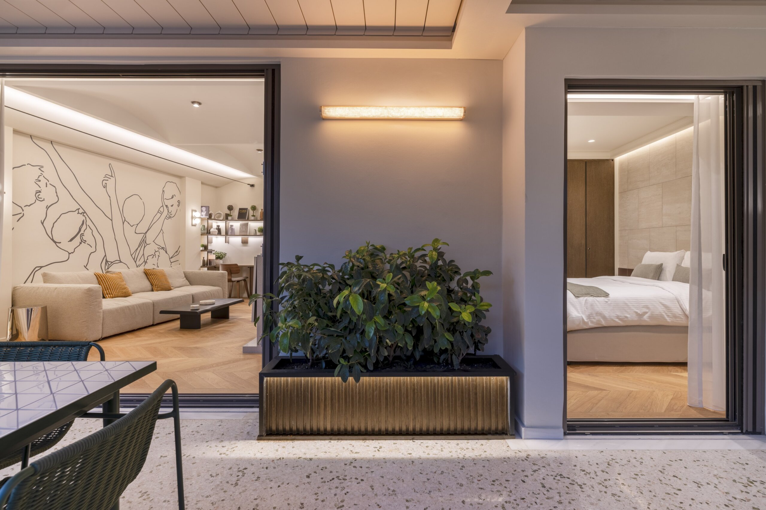 Private balcony with outdoor hot tub at Acropolis Luxury Penthouse in Koukaki, Athens
