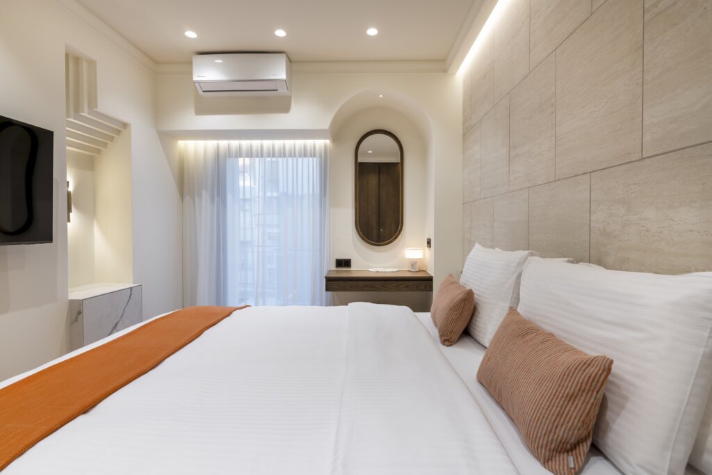 Bedroom with queen size bed at Acropolis Luxury Penthouse in Koukaki, Athens