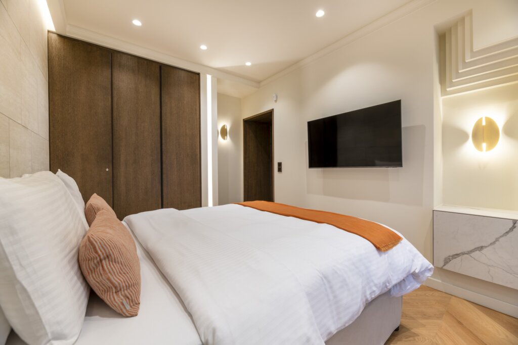 Bedroom with queen size bed at Acropolis Luxury Penthouse in Koukaki, Athens