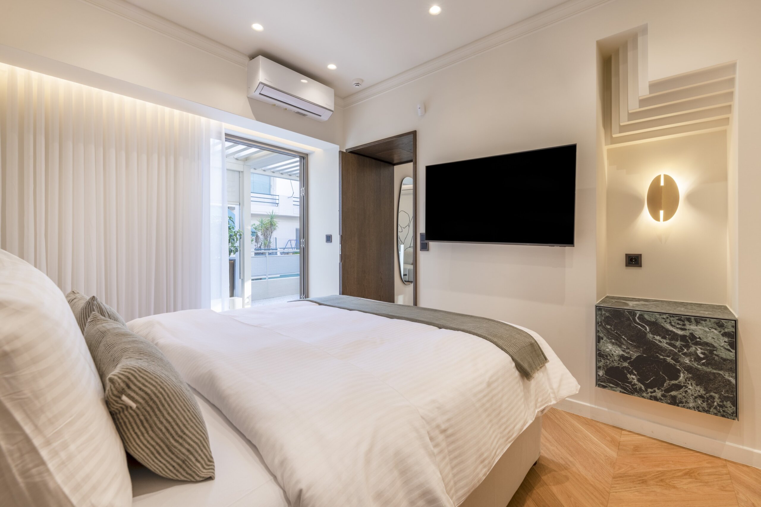 Bedroom with queen size bed at Acropolis Luxury Penthouse in Koukaki, Athens