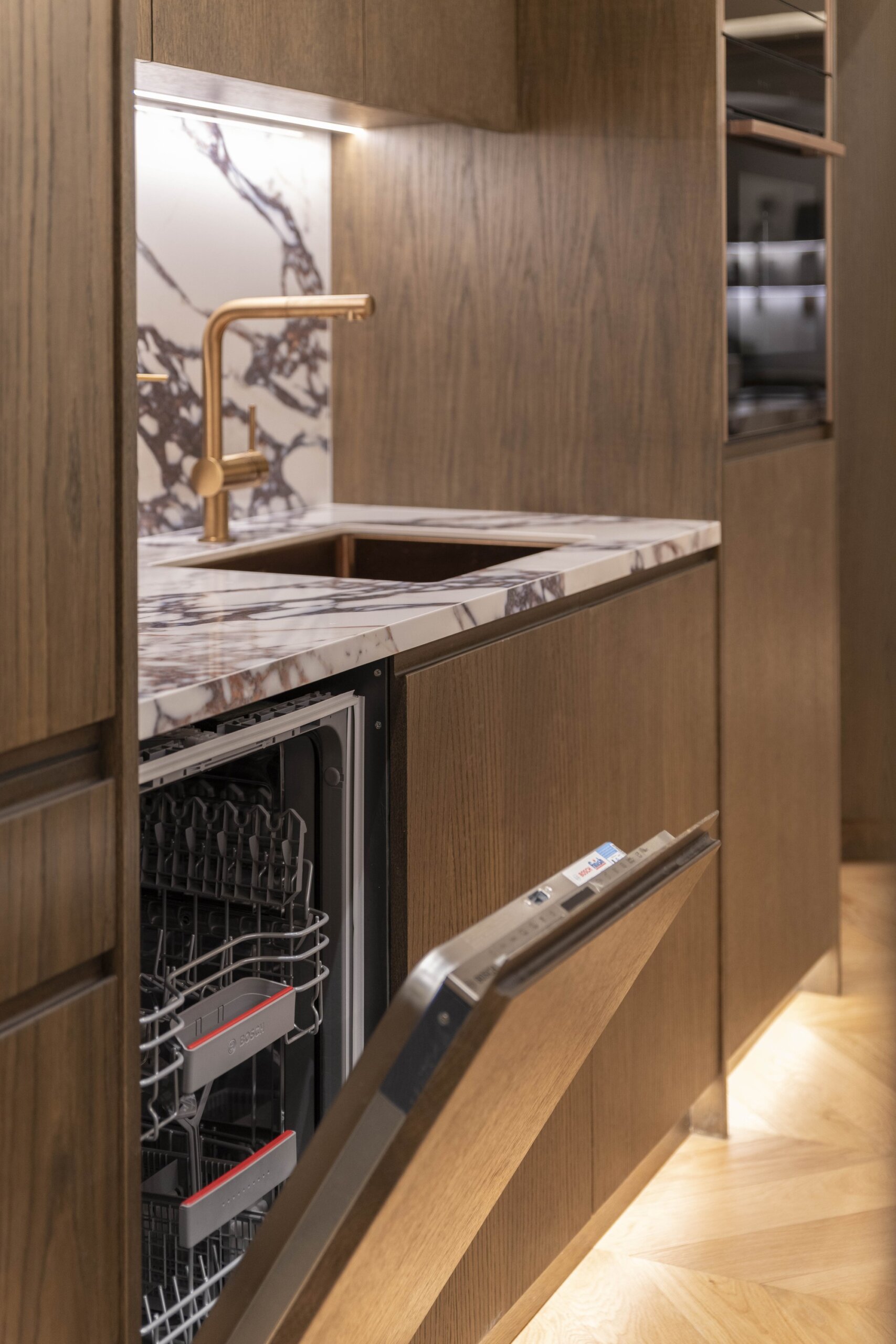 Open plan living room and fully equipped kitchen at Acropolis Luxury Penthouse in Koukaki, Athens