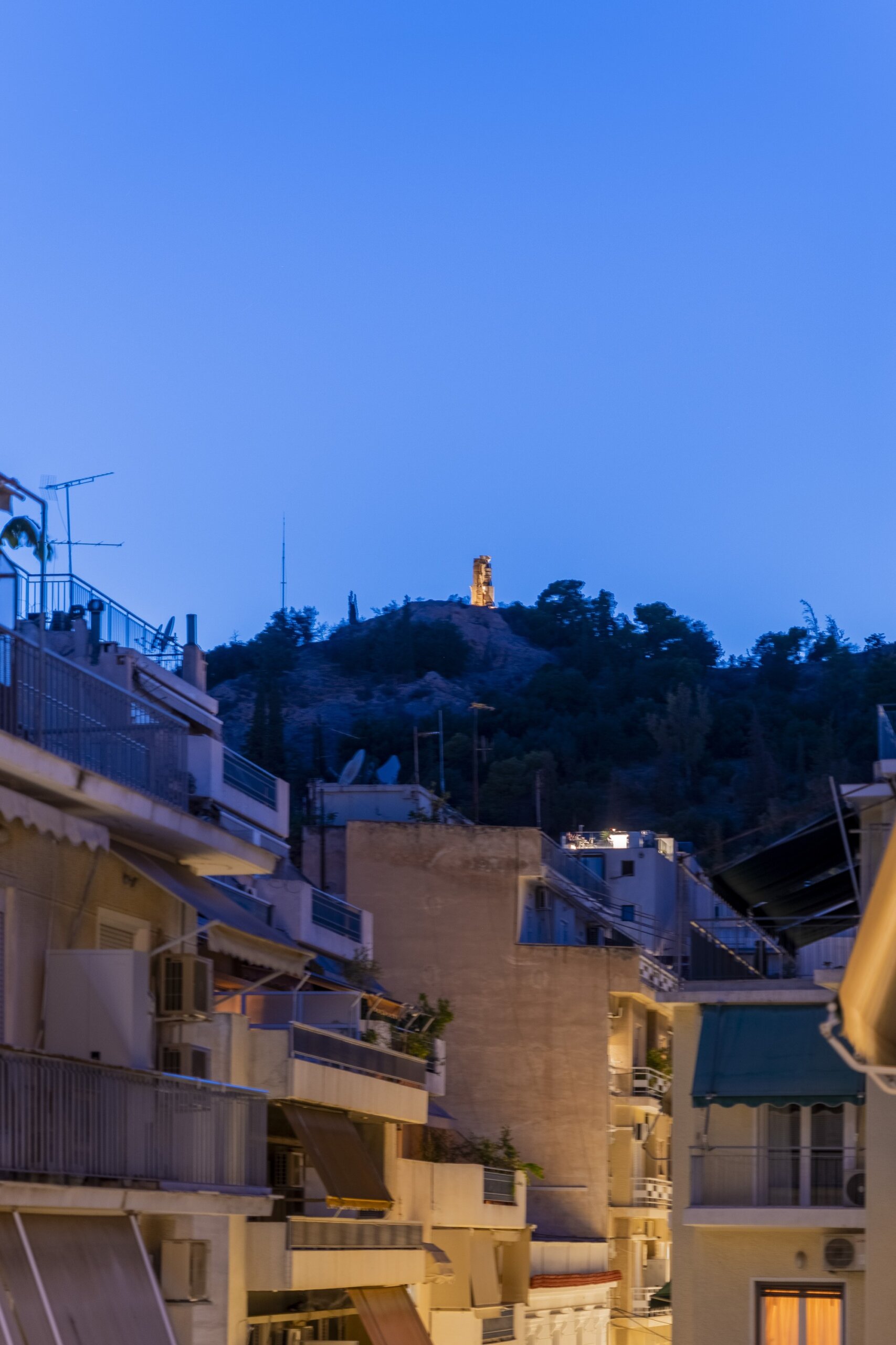 Private balcony with outdoor hot tub at Acropolis Luxury Penthouse in Koukaki, Athens